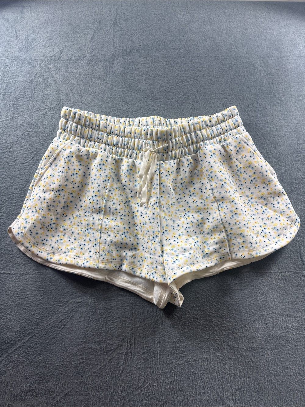 Blogilates - Blue and Yellow Floral Marshmallow Dolphin Short NWOT